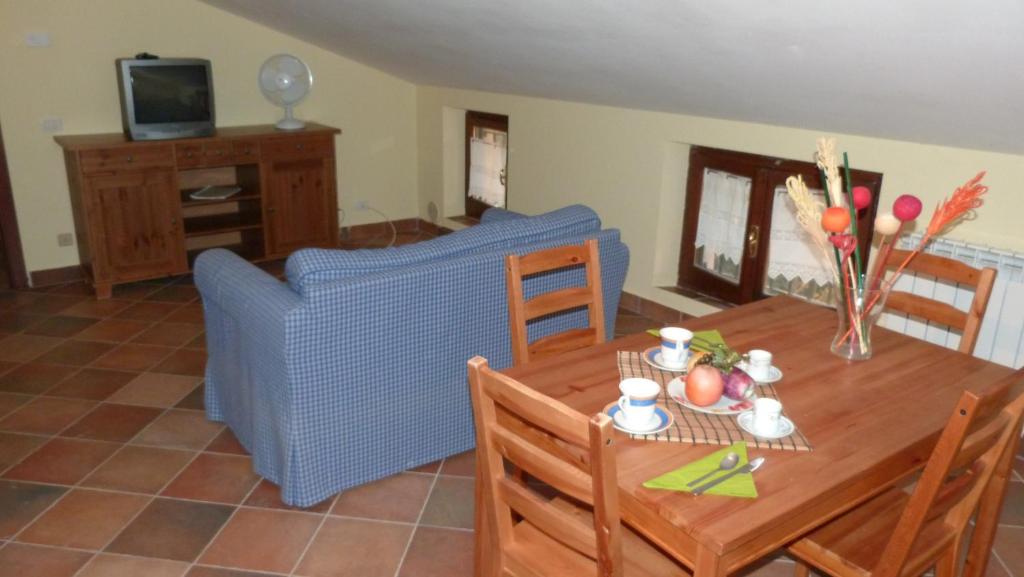 TV a/nebo společenská místnost v ubytování Appartamenti Albarosa by Holiday World