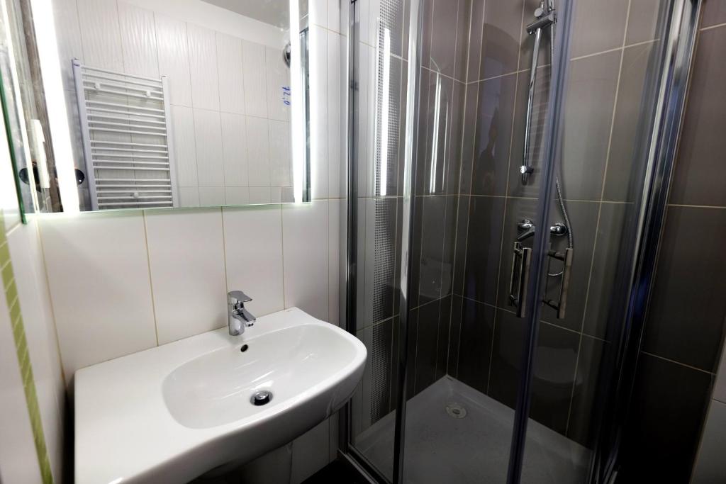 Koupelna v ubytování Hotel Mazurek