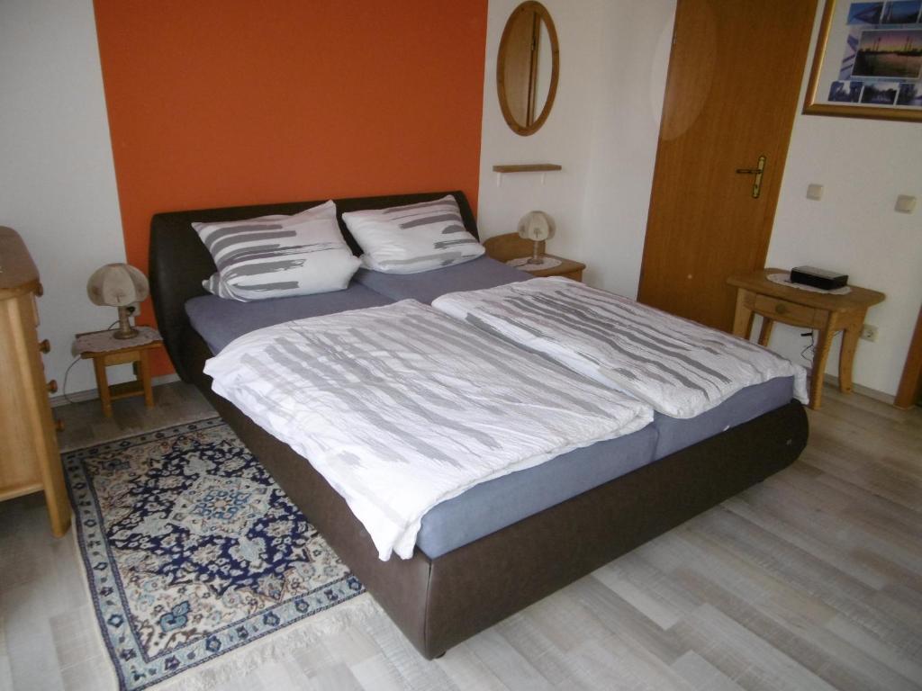 Ein Bett oder Betten in einem Zimmer der Unterkunft Wotan