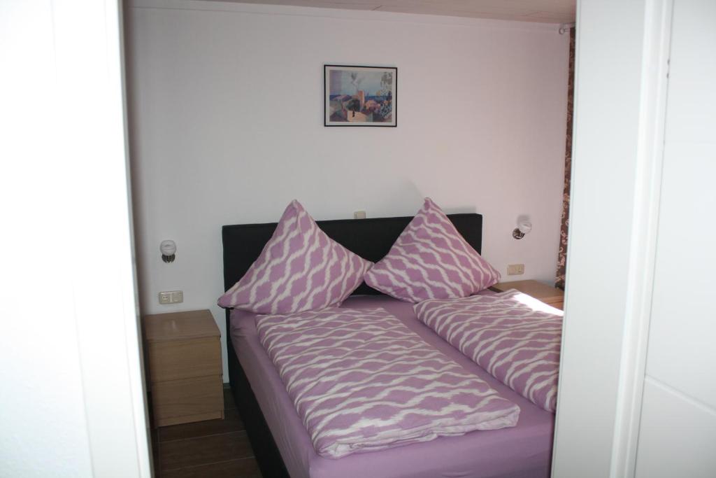 Postel nebo postele na pokoji v ubytování Ferienwohnung Ziemons