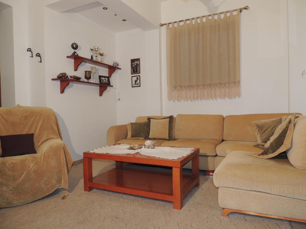 a living room with two couches and a coffee table at Christine Villa Pefkos in Pefki Rhodes