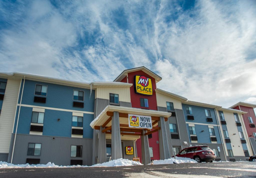 a building with a mcdonalds sign in a parking lot at My Place Hotel-Ketchikan, AK in Ketchikan