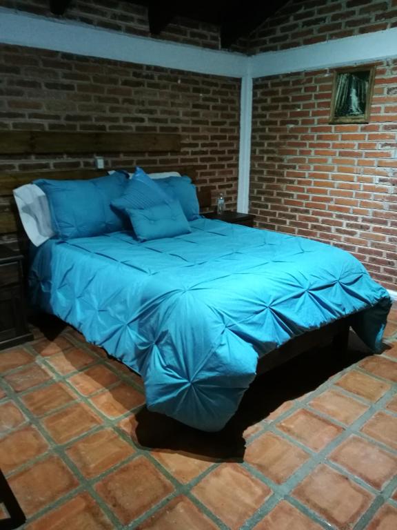 Postel nebo postele na pokoji v ubytování Hospedaje Herradura