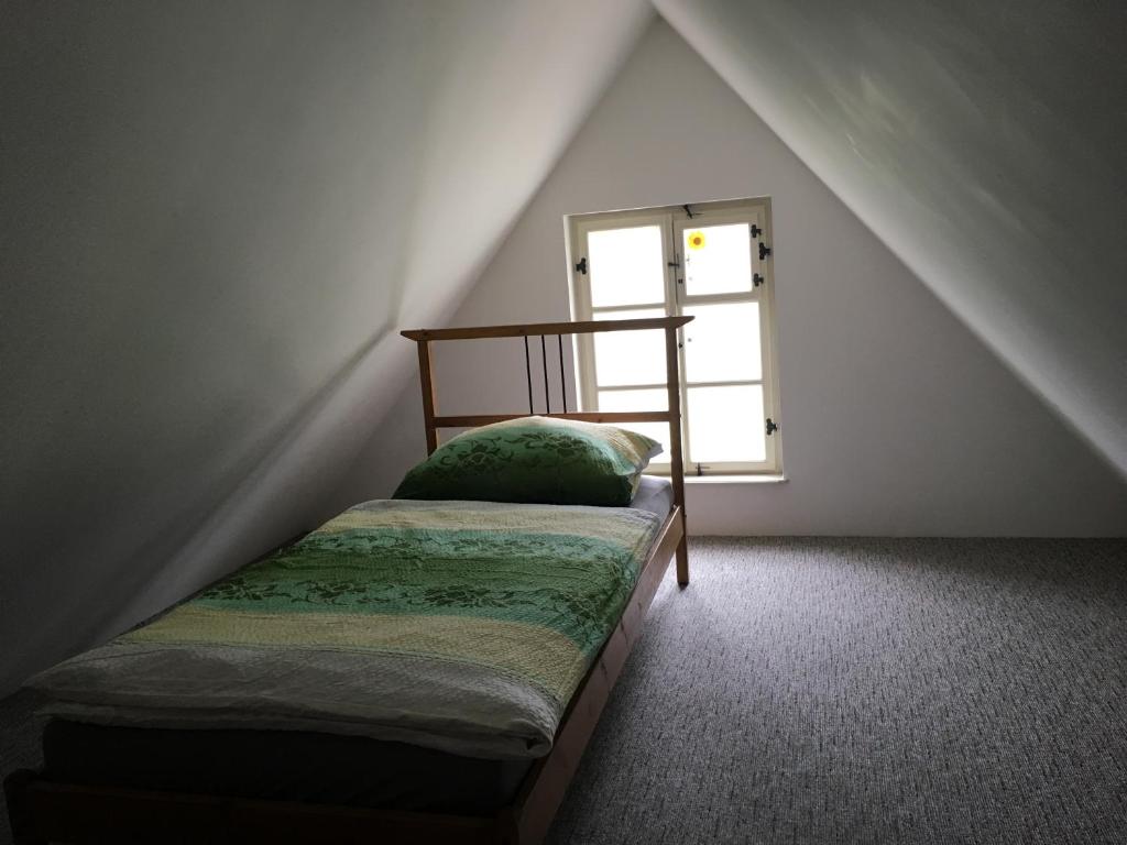 Postel nebo postele na pokoji v ubytování Chalupa u Broumovských stěn