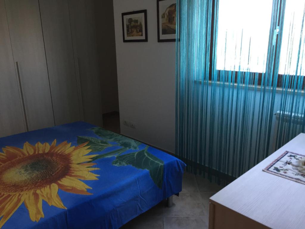 Posteľ alebo postele v izbe v ubytovaní Salieri Apartment