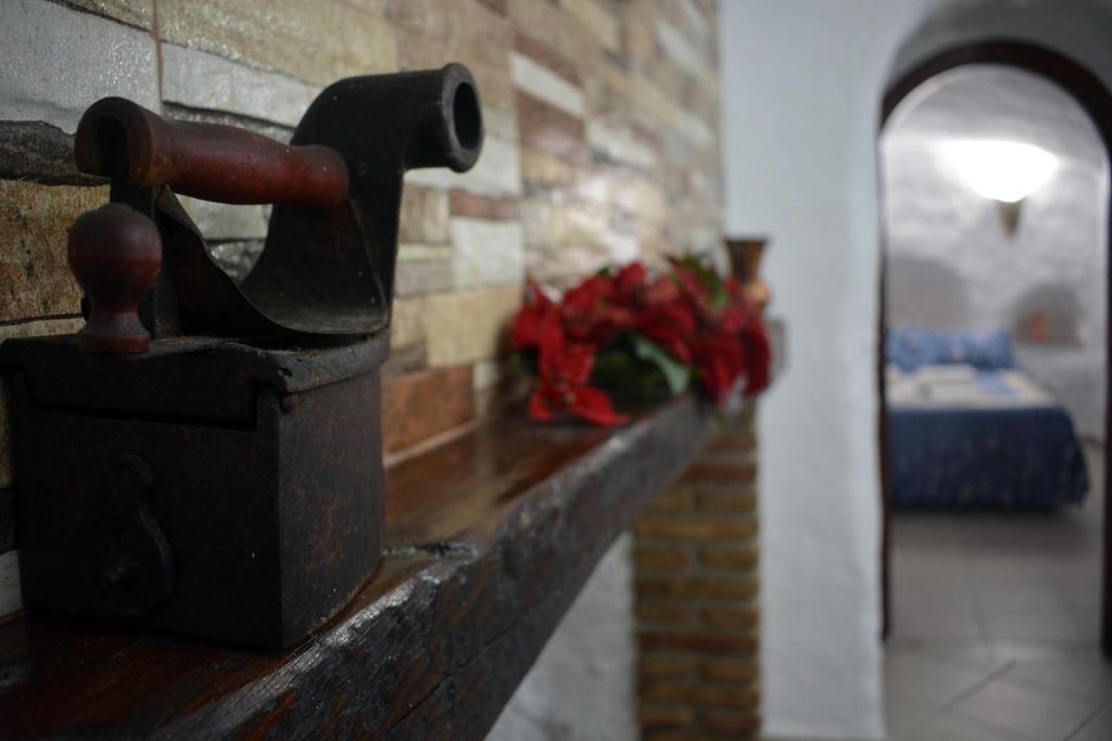Postel nebo postele na pokoji v ubytování Casas Cuevas El Mirador con piscina y barbacoa