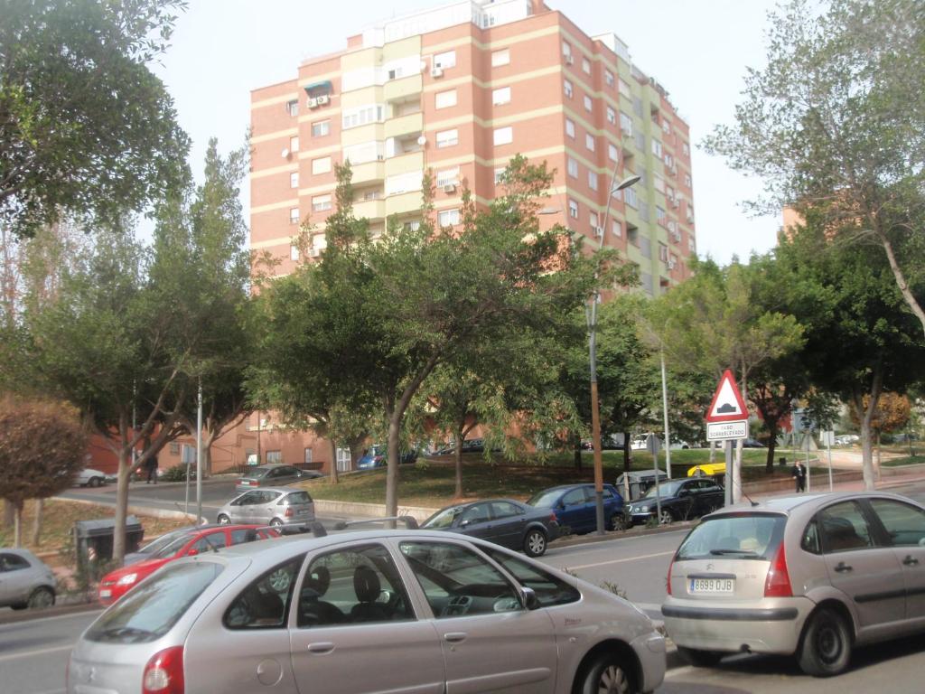 a group of cars parked in a parking lot at Confortable excelentes vistas in Almería