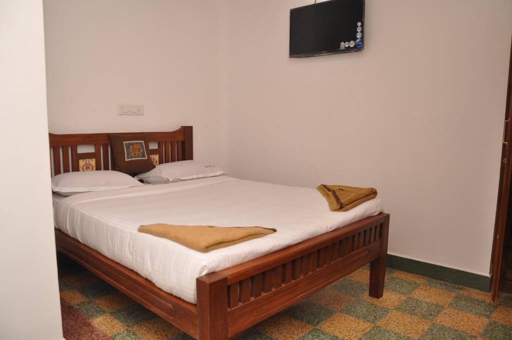 Postel nebo postele na pokoji v ubytování Rams Inn