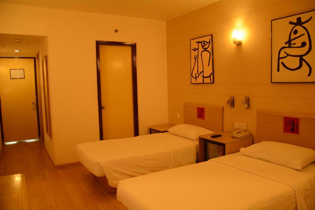 Postel nebo postele na pokoji v ubytování Red Fox by Lemon Tree Hotels, Jaipur