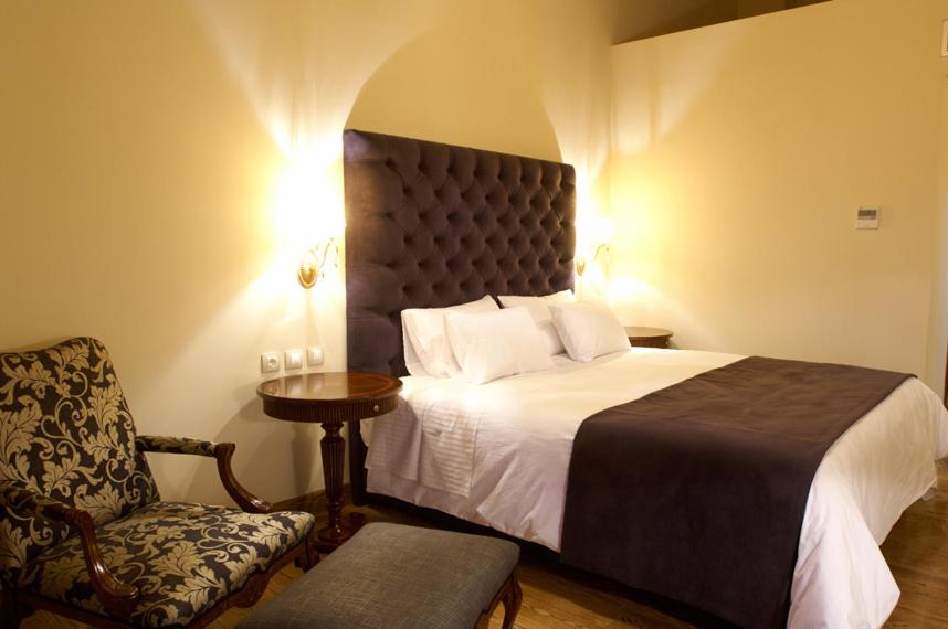 Postel nebo postele na pokoji v ubytování Tagli Resort & Villas