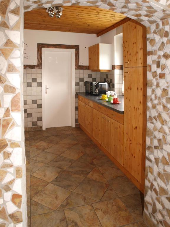 Kuchyň nebo kuchyňský kout v ubytování Ferienwohnung Brennseeblick
