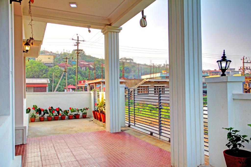 Μπαλκόνι ή βεράντα στο Coorg Rahul Villa- 3 Deluxe Bedrooms