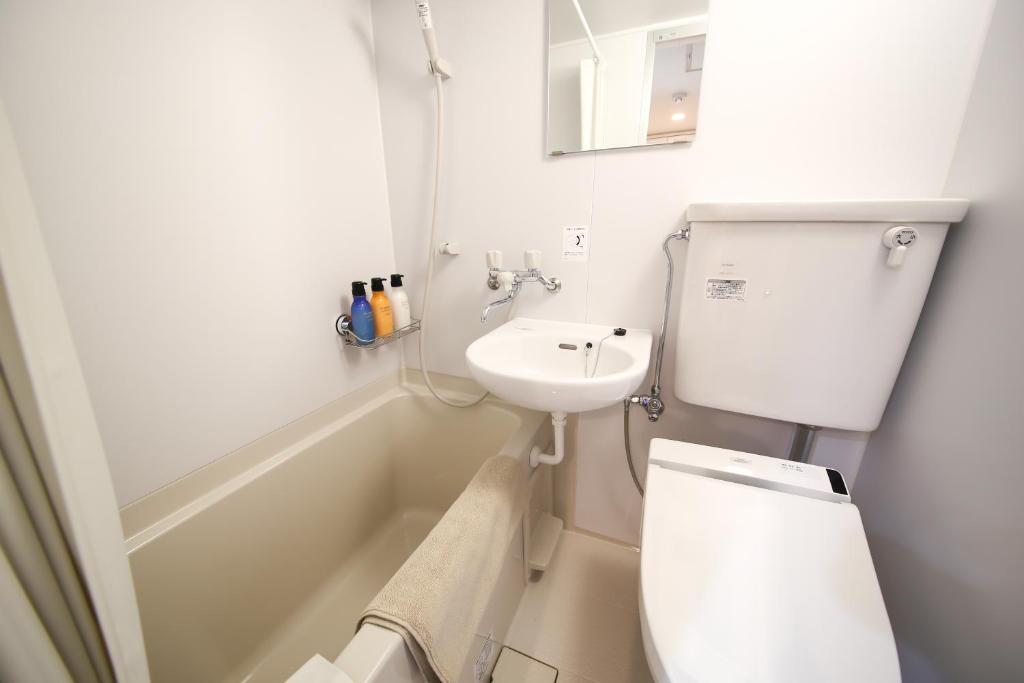Koupelna v ubytování Hotel CoCoDe Plus