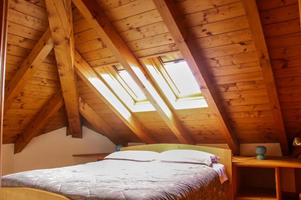 Posteľ alebo postele v izbe v ubytovaní Locanda Aurora B&B