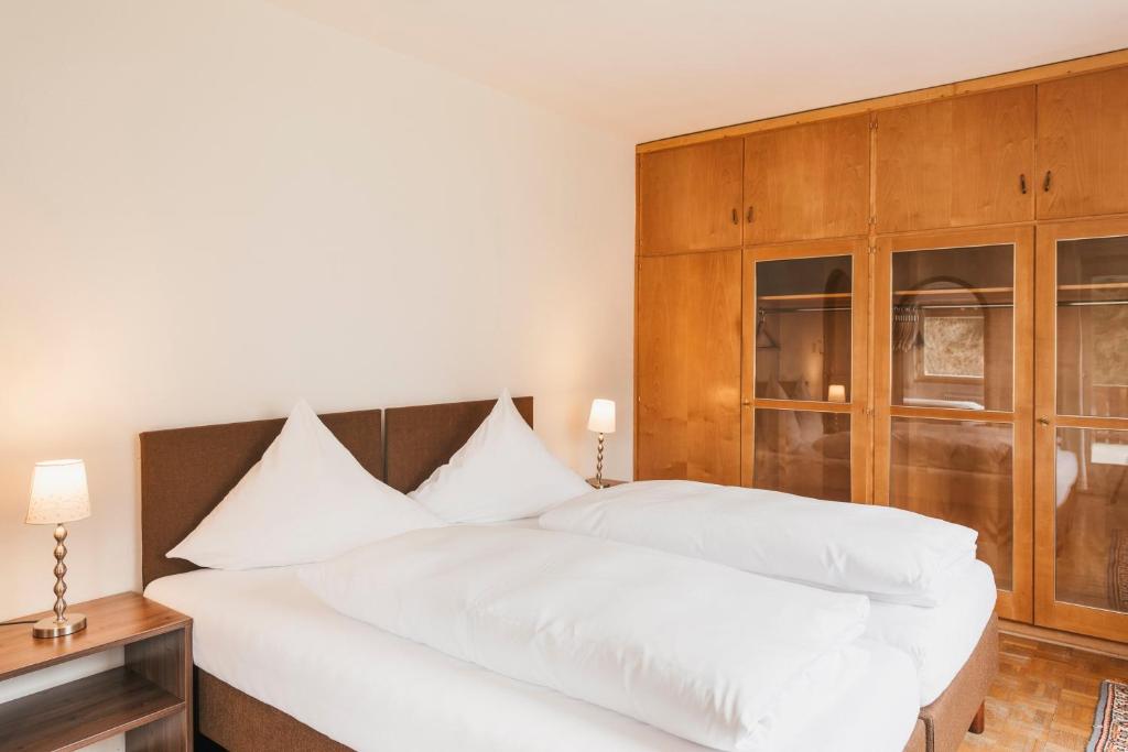 A bed or beds in a room at Ferienhaus Hoferwirt