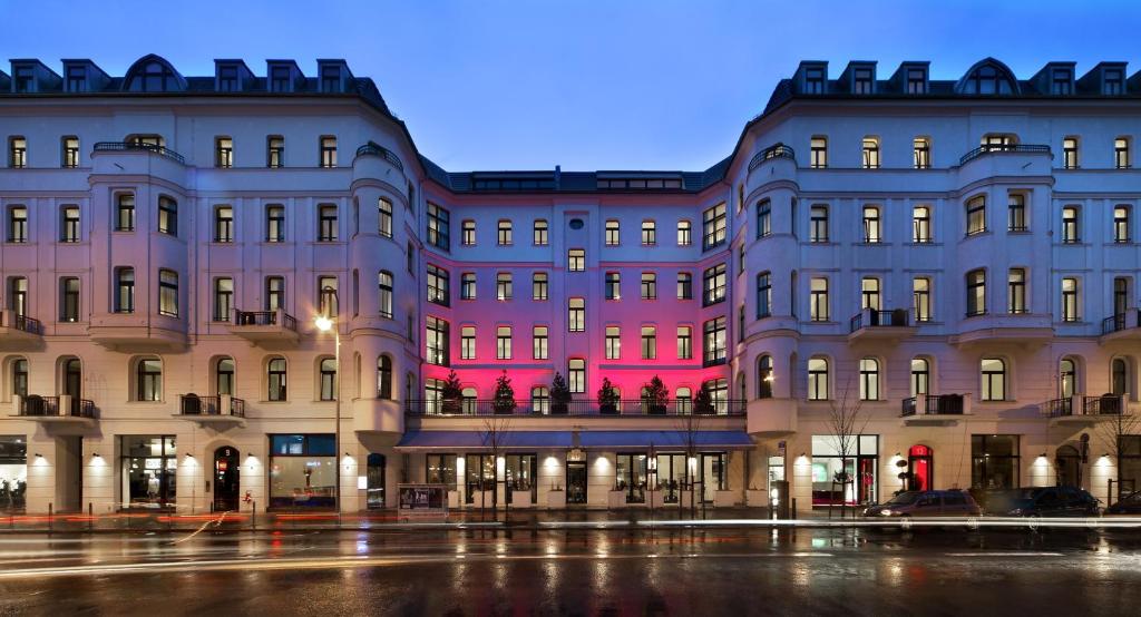 a large building is lit up at night at Lux 11 Berlin-Mitte in Berlin