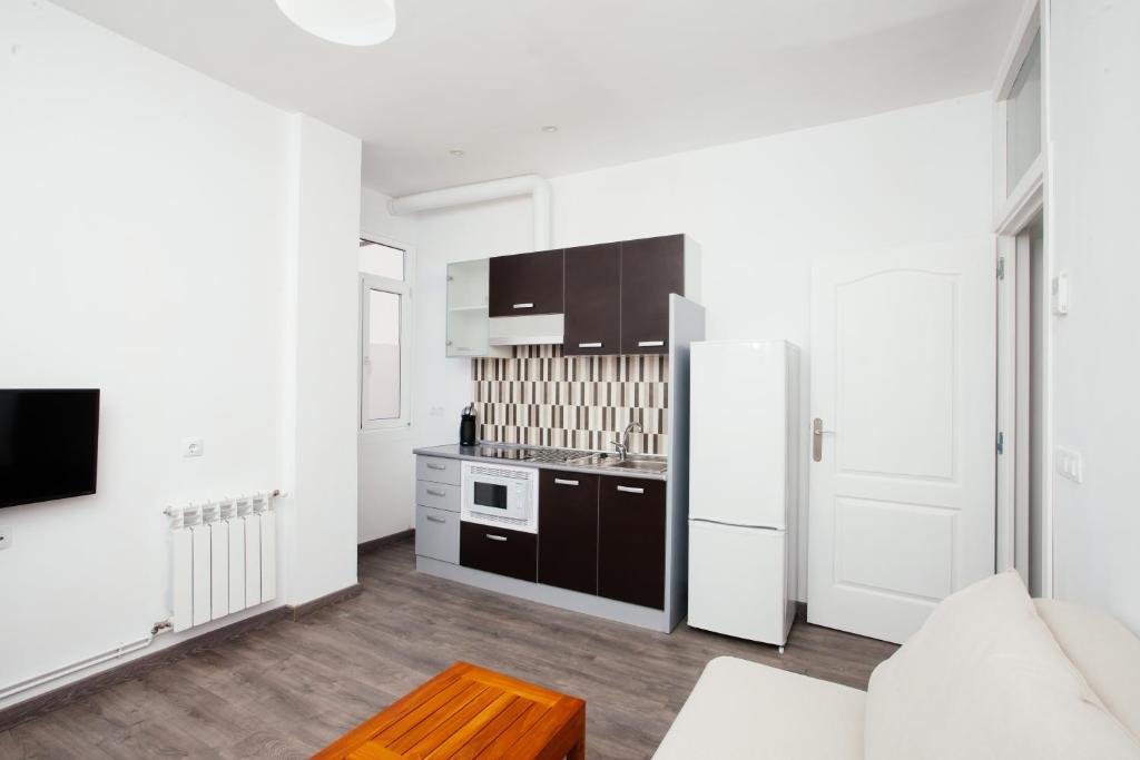 Kuchyňa alebo kuchynka v ubytovaní Apartamentos Florida 30