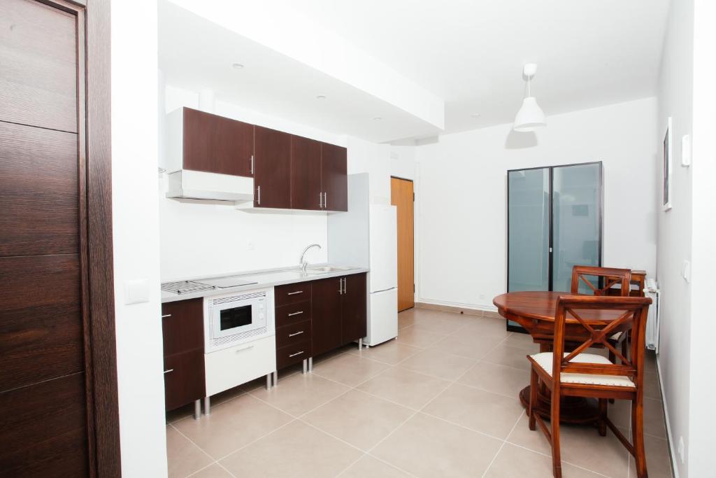 Kuchyňa alebo kuchynka v ubytovaní Apartamentos Florida 30