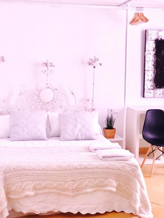 Postel nebo postele na pokoji v ubytování Casa Bolsa43