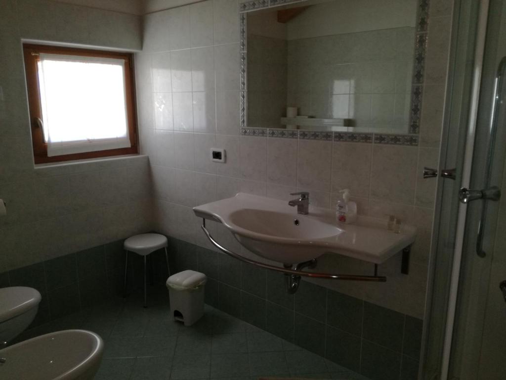 Koupelna v ubytování Agriturismo Le Cavade