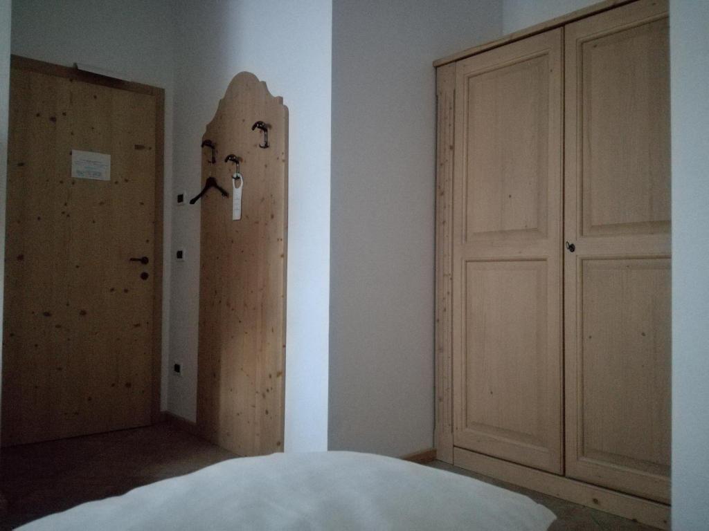 Postel nebo postele na pokoji v ubytování Agriturismo Le Cavade