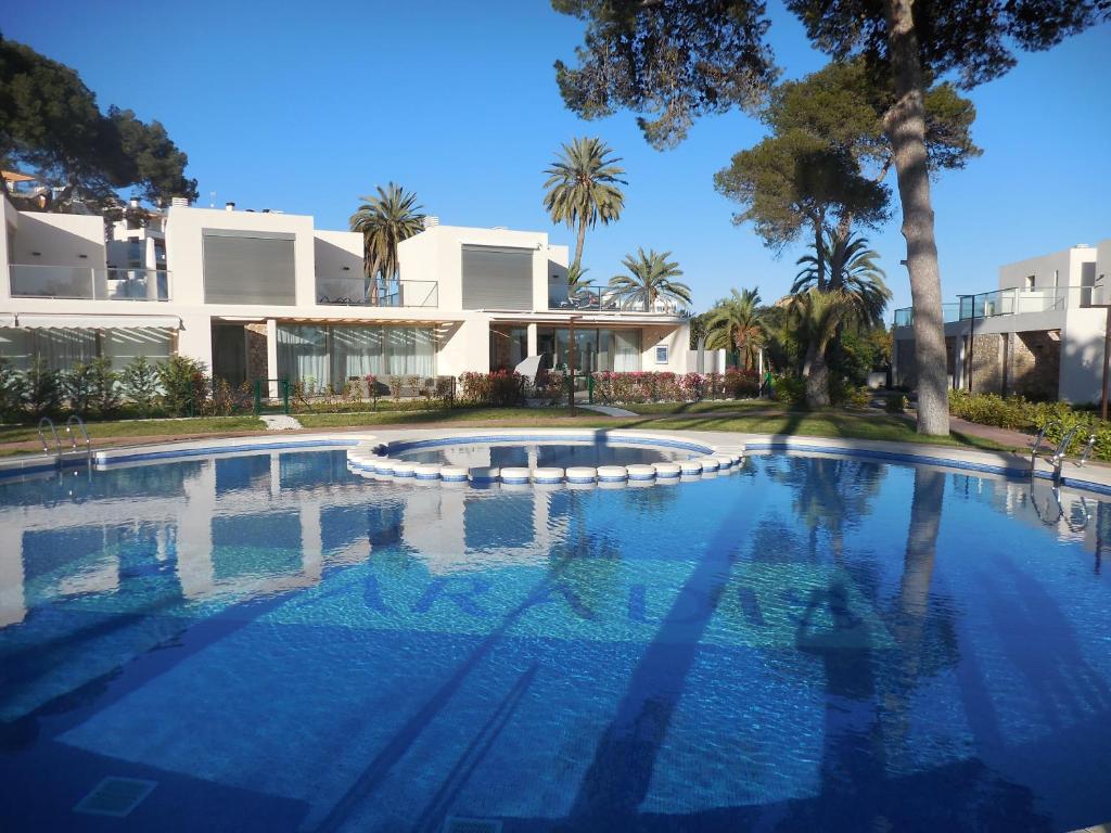 a large swimming pool in front of a building at Vila Paradis 18 in Villajoyosa