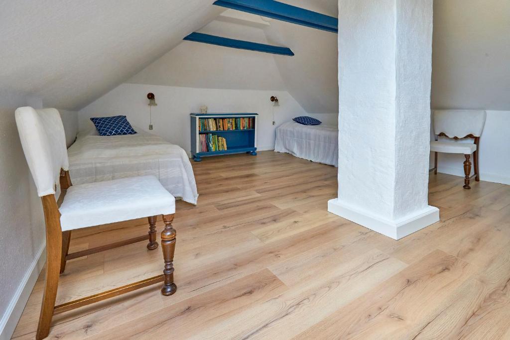 Postel nebo postele na pokoji v ubytování Møllegade 1 Holiday House