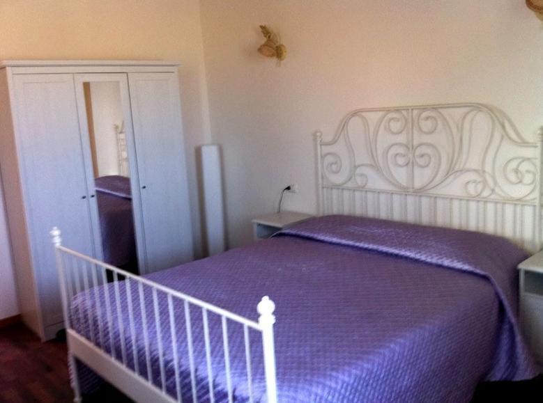 Postel nebo postele na pokoji v ubytování Conero Ranch