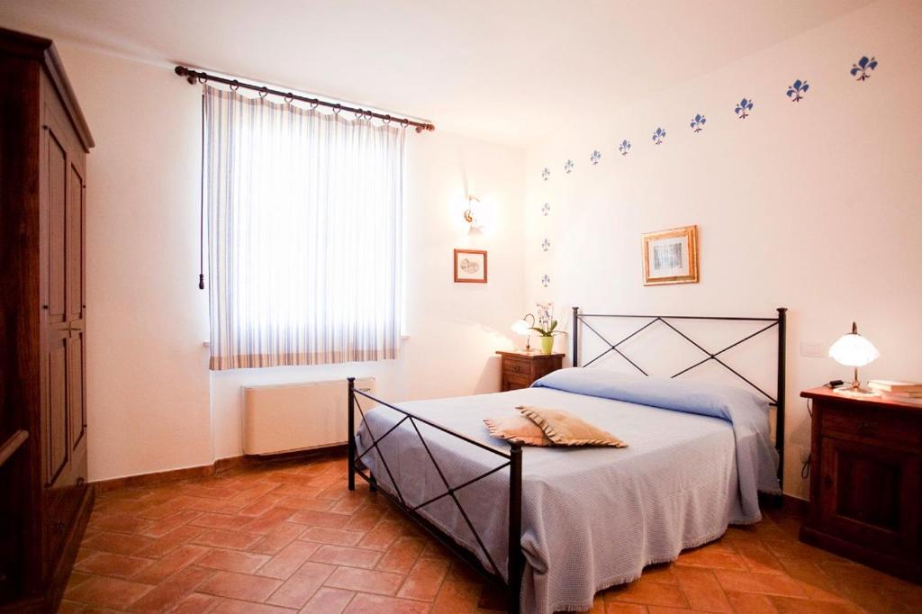Posteľ alebo postele v izbe v ubytovaní Agriturismo Vigna Mai