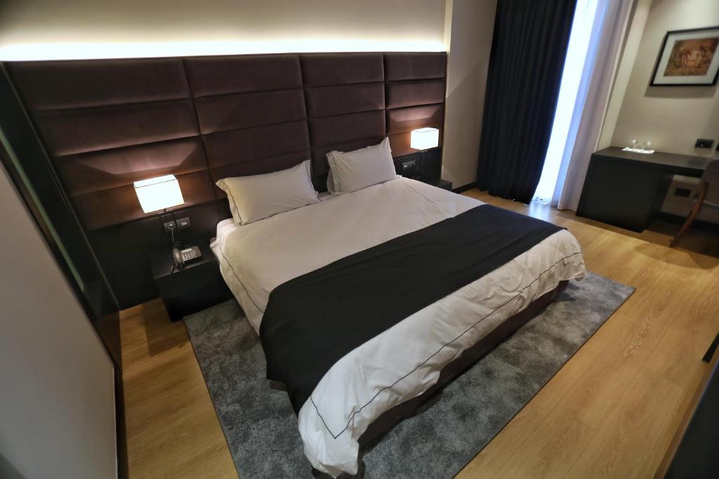 Postel nebo postele na pokoji v ubytování Privilege Hotel & Spa