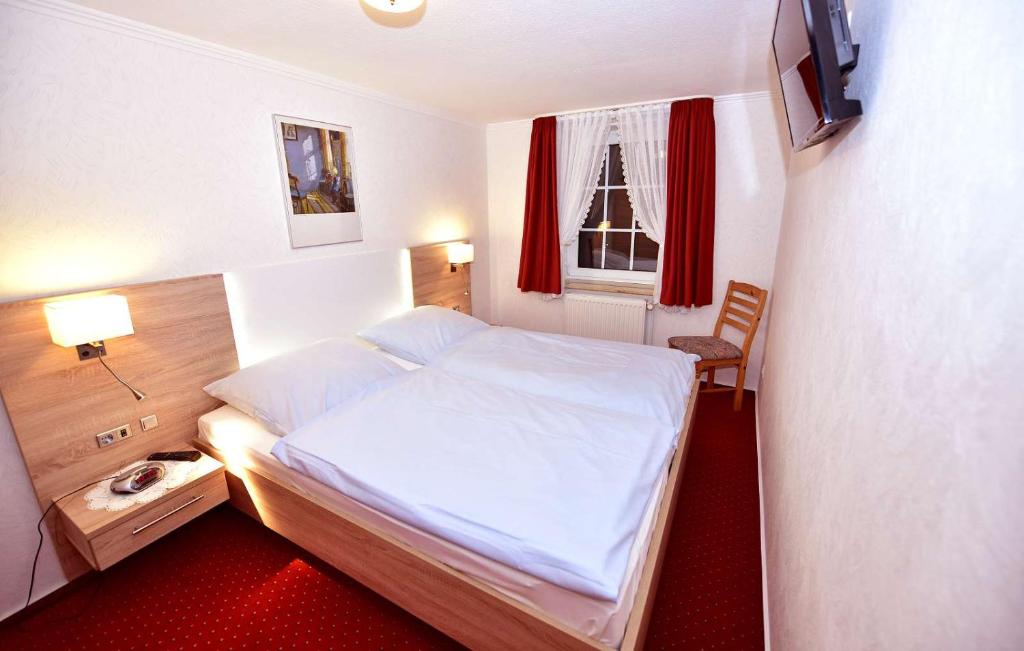 Postel nebo postele na pokoji v ubytování Hotel-England