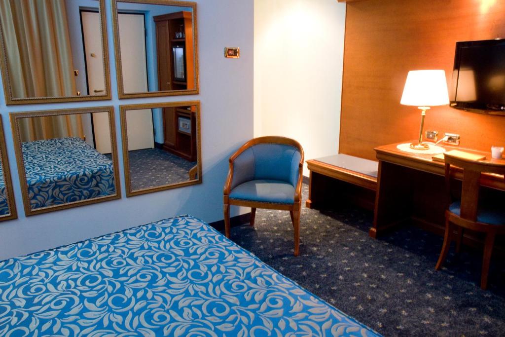 Postel nebo postele na pokoji v ubytování HM MotelHotel