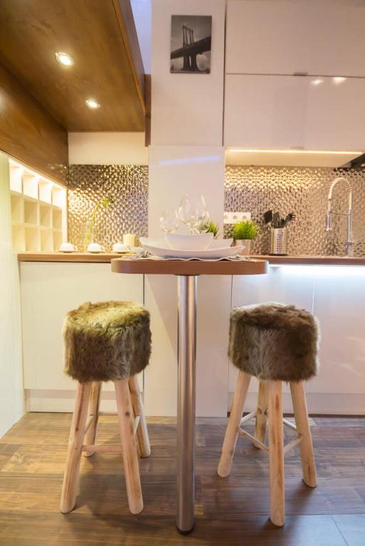 Kuchyňa alebo kuchynka v ubytovaní Gold Apartman