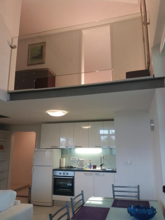 Kuchyňa alebo kuchynka v ubytovaní Apartment Osk