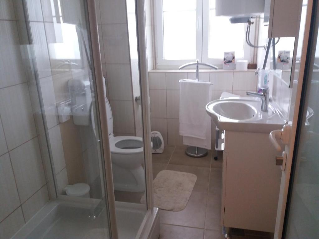 Kúpeľňa v ubytovaní Apartment Osk