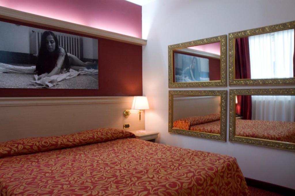 Postel nebo postele na pokoji v ubytování HM MotelHotel