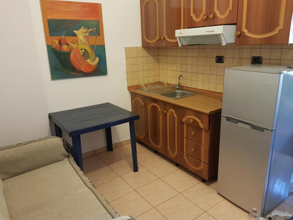 Dapur atau dapur kecil di Vila Melpo Apartments