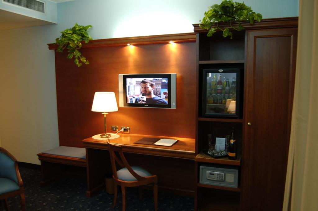TV a/nebo společenská místnost v ubytování HM MotelHotel