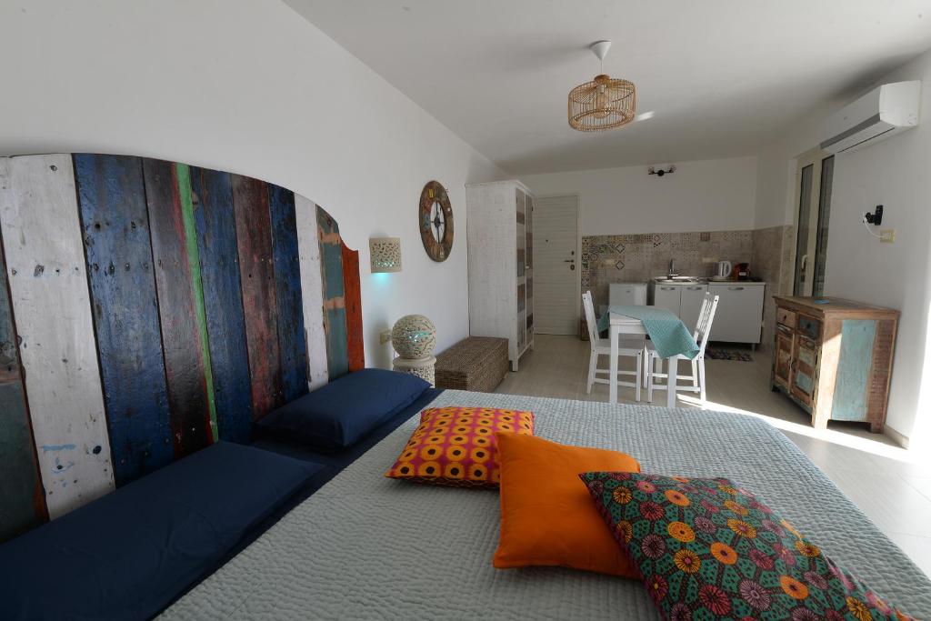 Postel nebo postele na pokoji v ubytování B&B A Pochi Passi