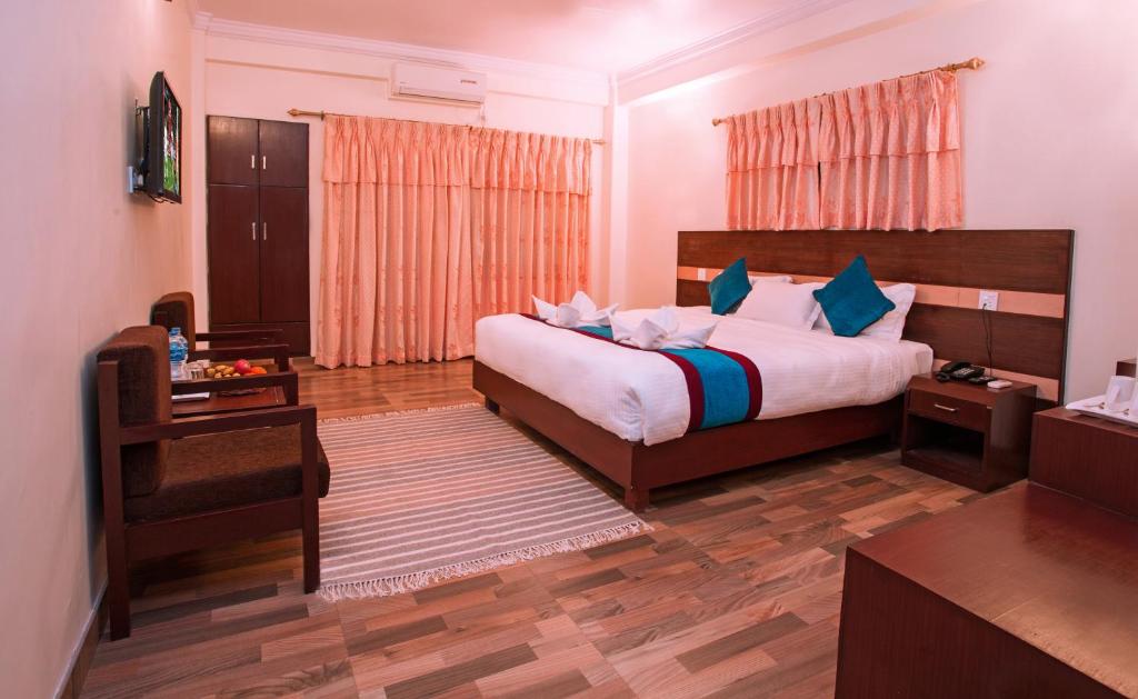Voodi või voodid majutusasutuse Hotel Spring toas