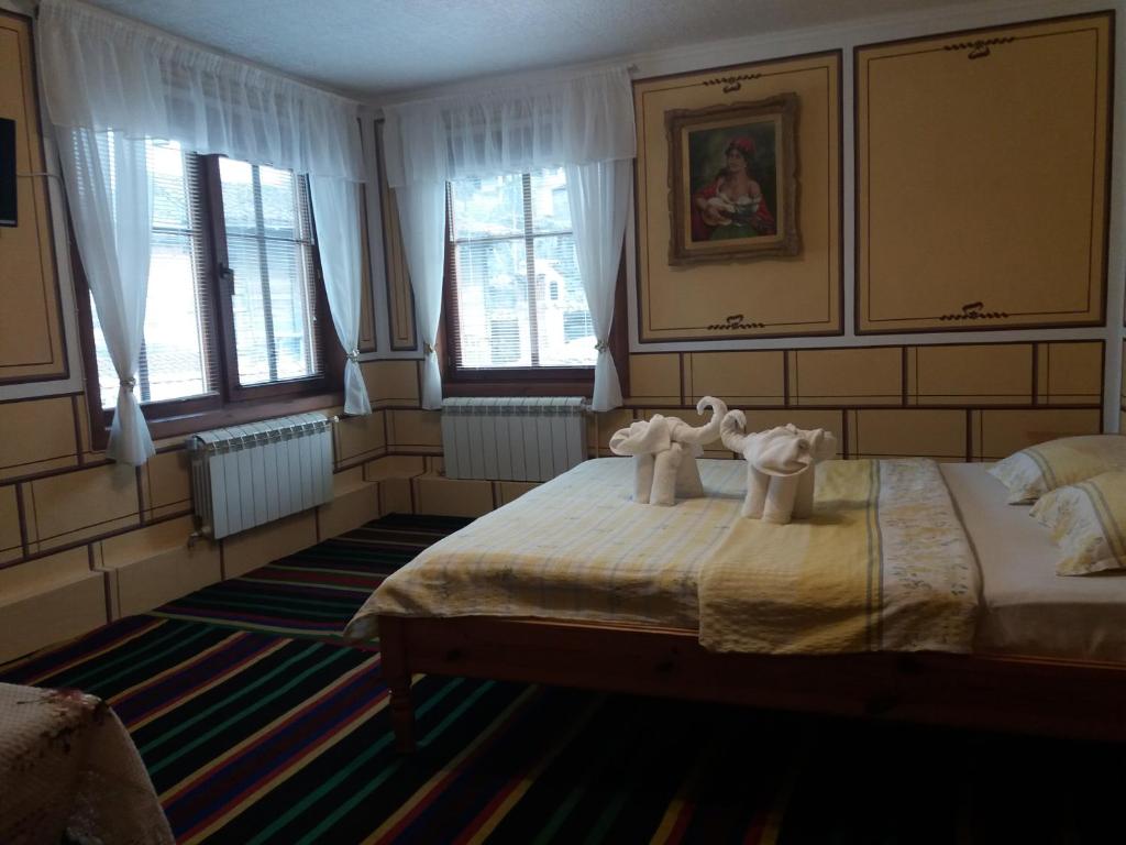 Postel nebo postele na pokoji v ubytování Guest House Bashtina Striaha