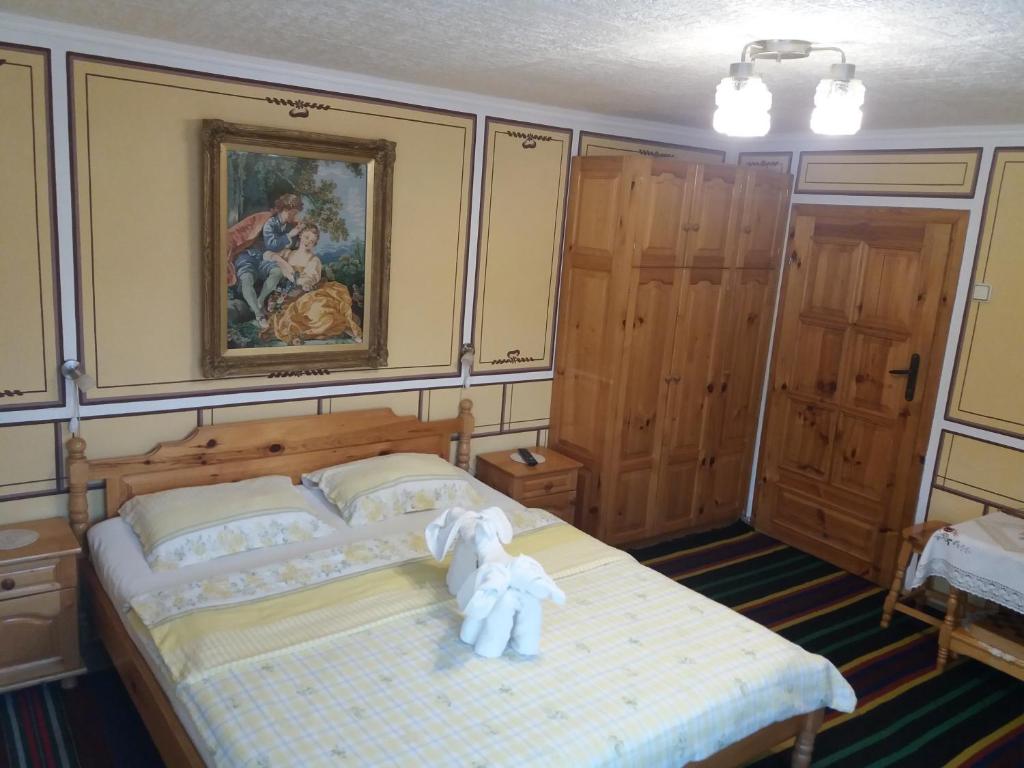 Postel nebo postele na pokoji v ubytování Guest House Bashtina Striaha