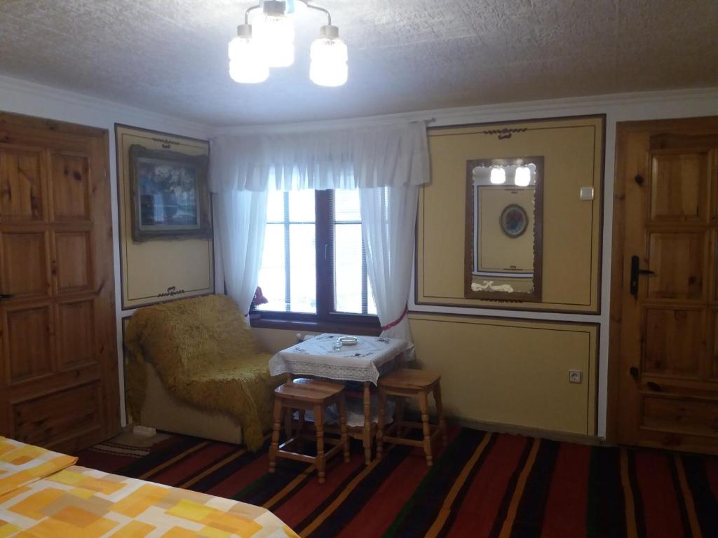 Postel nebo postele na pokoji v ubytování Guest House Bashtina Striaha