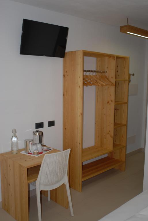 TV a/nebo společenská místnost v ubytování B&B Alciliegio