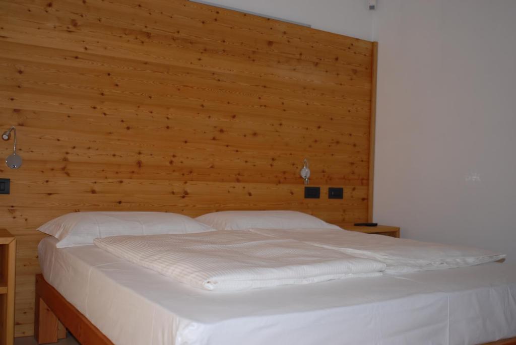 Postel nebo postele na pokoji v ubytování B&B Alciliegio