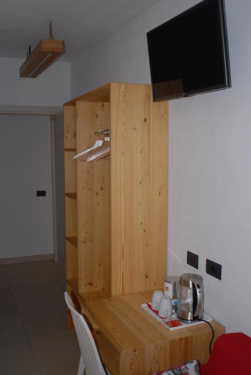 TV a/nebo společenská místnost v ubytování B&B Alciliegio