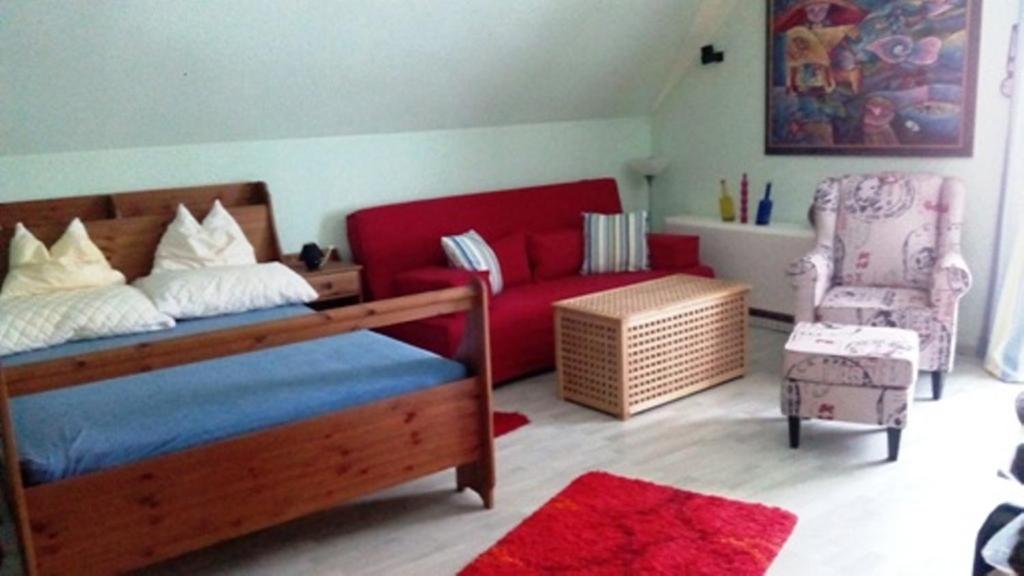 Postel nebo postele na pokoji v ubytování Gästehaus Fridolin