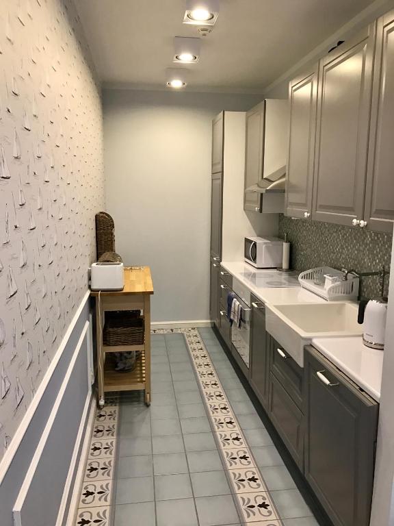 Kuchyňa alebo kuchynka v ubytovaní Morski Apartament Hampton w Playa Baltis