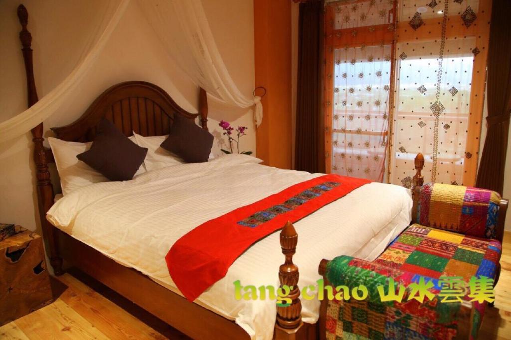 Postel nebo postele na pokoji v ubytování Shang Shui Yun Ji B&B