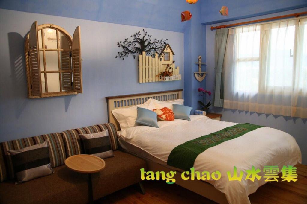 Postel nebo postele na pokoji v ubytování Shang Shui Yun Ji B&B